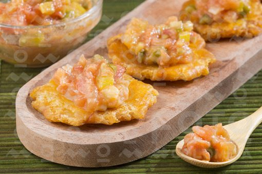 Patacones con hogao / Patacones with hogao